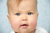 Adorable Baby child with chubby cheeks portrait