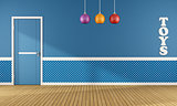 Blue playroom with closed door 