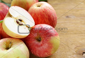 ripe red apples autumn harvest on a wooden table