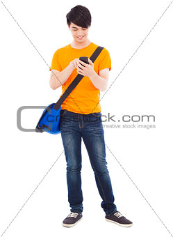 young student holding a smartphone and touching