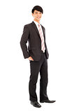 young businessman standing and hands on pocket. isolated on whit