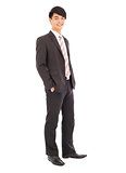 young businessman standing and hands on pocket. isolated on whit