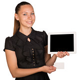 Beautiful girl in dress holding blank white card and tablet