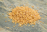 heap of gold flax seeds