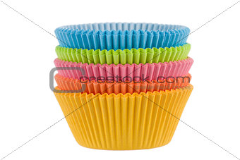 Colorful empty muffin cups on a white background
