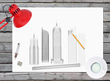 Architectural drawing and office supplies on the background of wooden boards