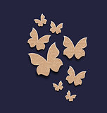 Dark background with butterflies made in carton paper