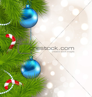 Christmas composition with fir branches, glass balls and sweet c