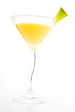 Delicious yellow cocktail isolated.