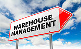 Warehouse Management on Red Road Sign.