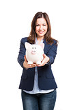 Business woman showing a piggy bank
