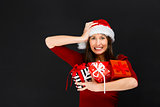 Woman holding christmas gifts