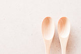 Closeup top view of  two wooden spoons