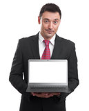 Handsome young man holding a laptop