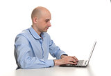 young confident business man with laptop