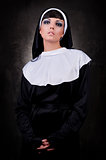 Portrait of young attractive nun