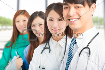 Professional medical doctor team standing in office