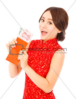  asian woman holding a red envelope with money