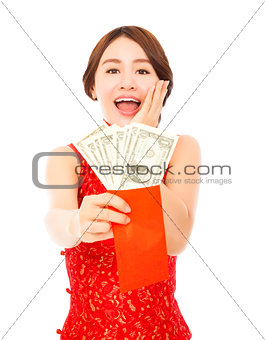 asian young woman holding a red envelope of dollar