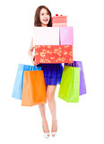 pretty woman holding shopping bags and gift boxes 