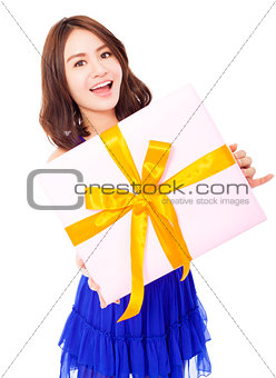pretty young woman holding a gift box 