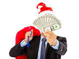 business man holding a christmas gift bag and money