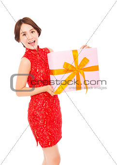 beautiful young asian woman holding a gift box