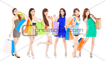 happy asian shopping women with color bags. isolated on white