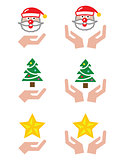 Hands with Christmas icons - Santa Claus, tree, star