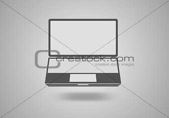 Laptop icon on gray background.