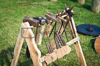 Old rack with blacksmith's tool