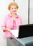 Senior Woman Votes Electronically