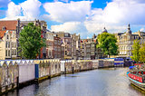 Scenic view of canal in Amsterdam at flower market