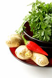 Asian style ingredients (ginger, chilli, coriander and garlic) in traditional utensils