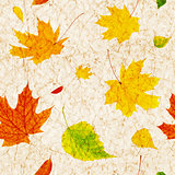 Seamless grunge background with flying autumn leaves