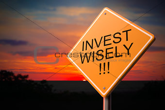 Invest Wisely on Warning Road Sign.