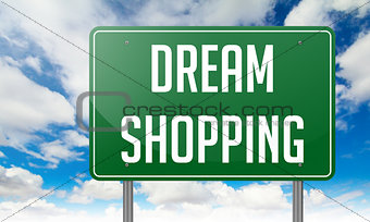 Dream Shopping on Highway Signpost.