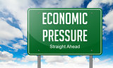 Economic Ppressure on Highway Signpost.