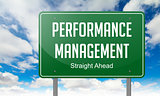 Performance Management on Highway Signpost.