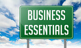 Business Essentials on Highway Signpost.