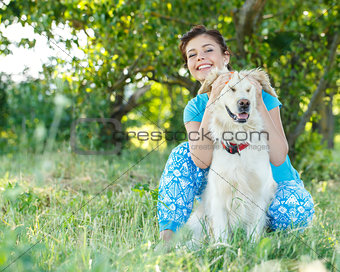 Attractive girl with dog