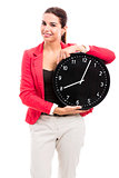 Business woman holding a clock