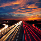 Speed Traffic at Dramatic Sundown Time - light trails 