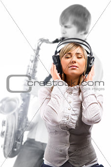 Lovely girl in headphones listening music 