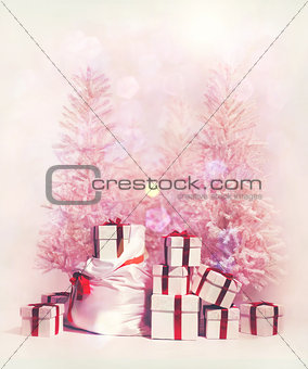 Christmas trees with heap of gift boxes 