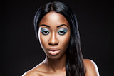 Beautiful young black woman with makeup
