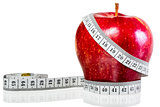 centimeter wrapped around red apple on a white background