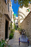Narrow mediterranean stone street in Stari Grad