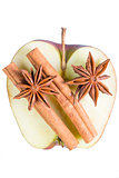 anise and cinnamon on a juicy apple