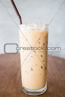 Fresh brewed ice coffee on wooden table